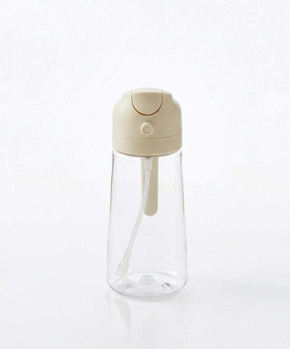 Pulverizador de aceite Eco-Mist con botella transparente y cabezal blanco, utensilio de cocina práctico para dosificar aceite de forma uniforme