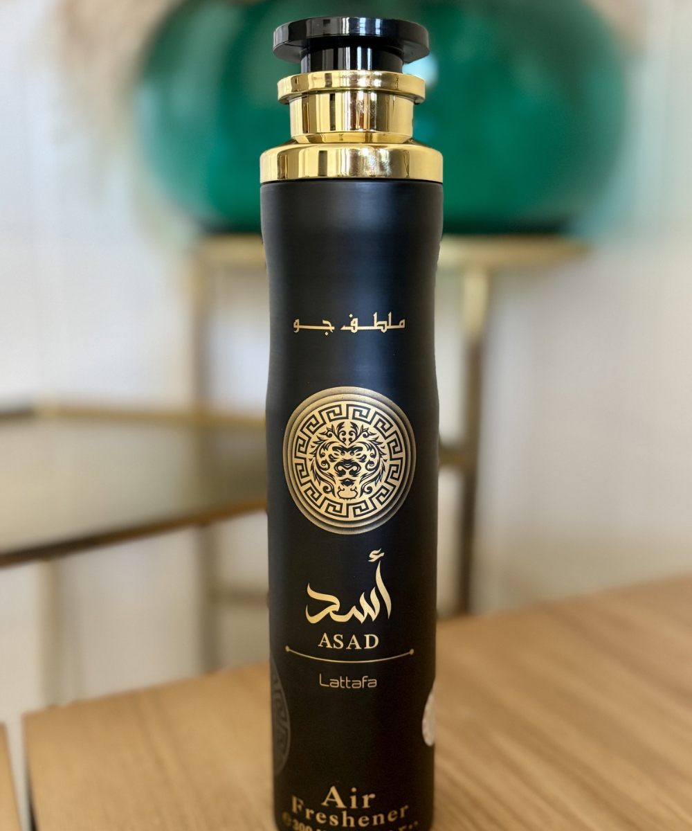 Spray ambientador Lattafa Asad con aroma cálido y especiado, ideal para textiles y estancias